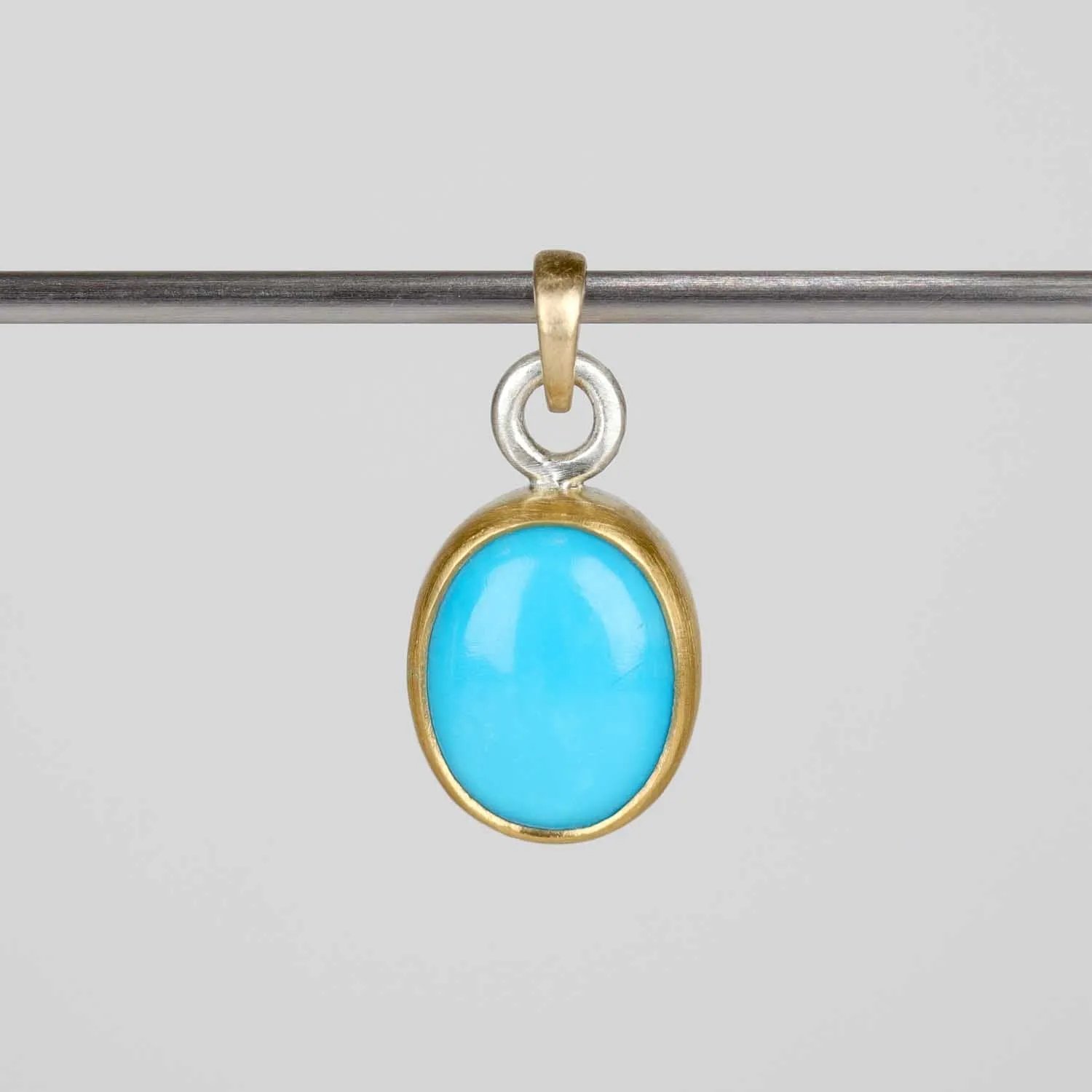 . Bezel-set Arizona Turquoise Set in Gold & Silver